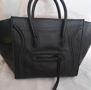 Celine Phantom luggage bag with tags